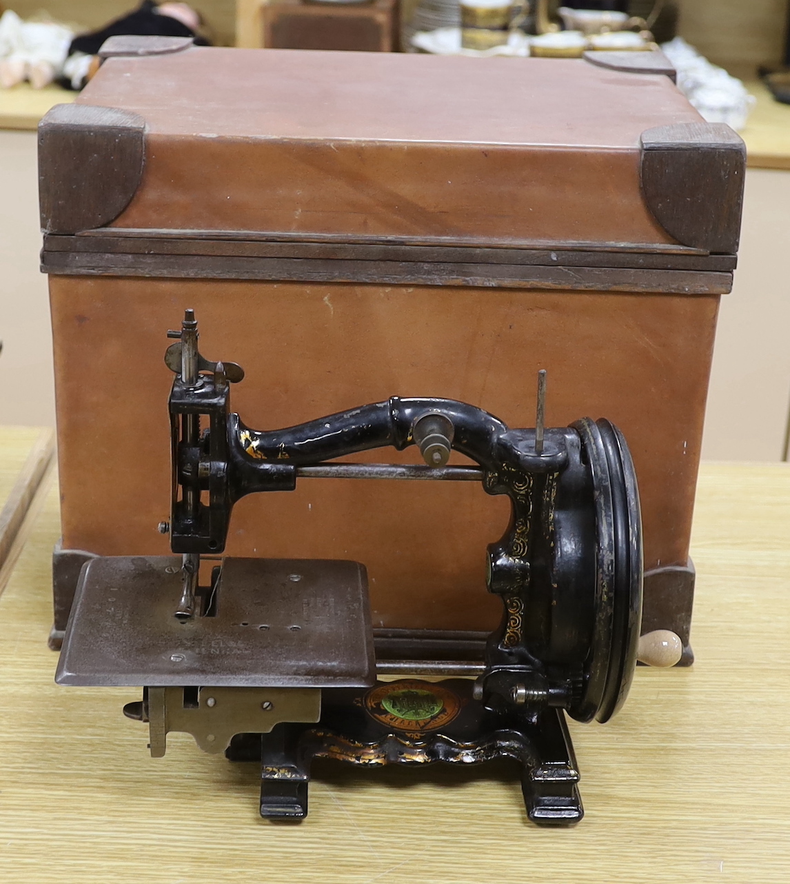 An 1870s Imperial Sewing Machine Co. Challenge model with box